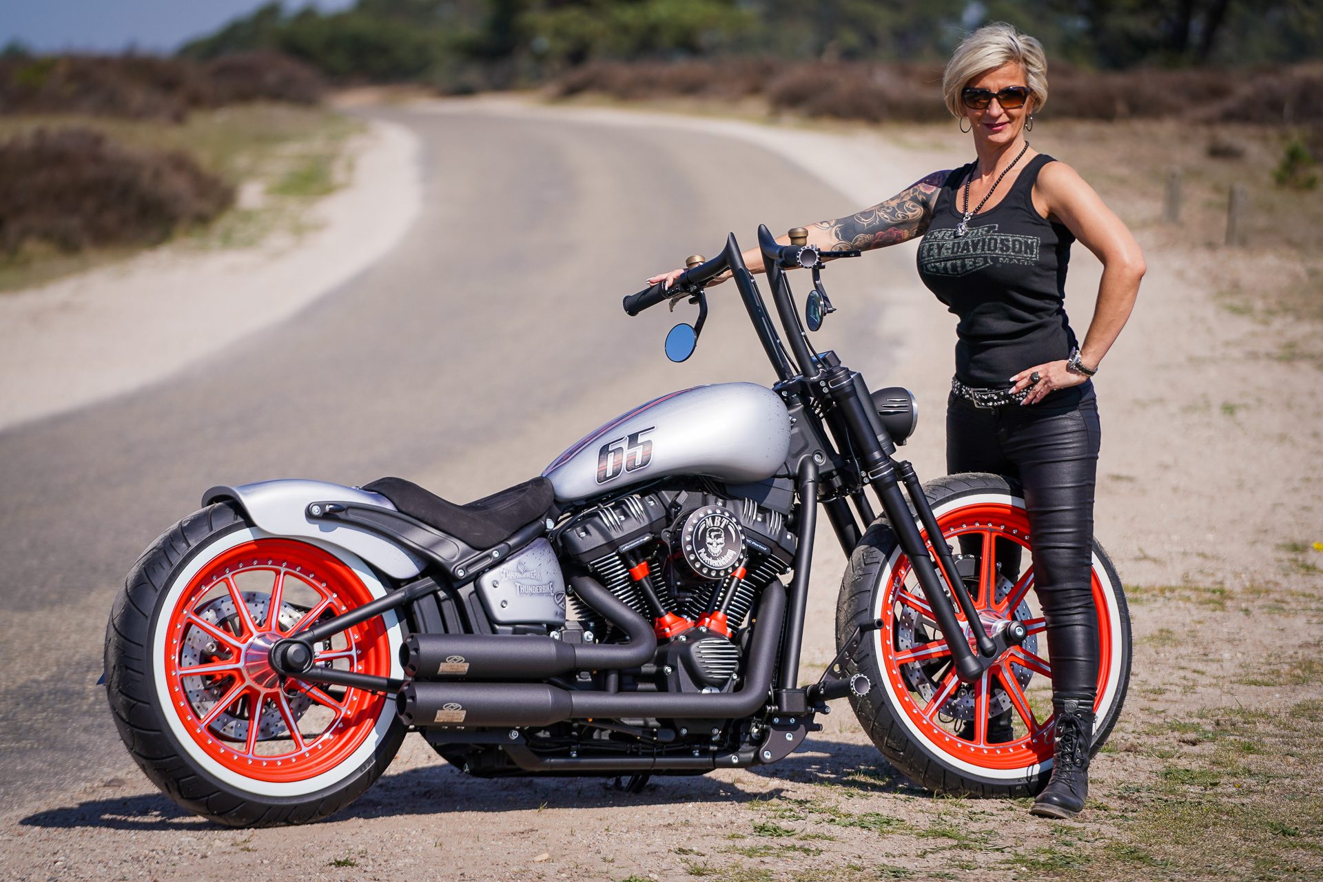 Red Wheel MBT customized Thunderbike Harley-Davidson Street Bob with Owner Sandra by Ben Ott