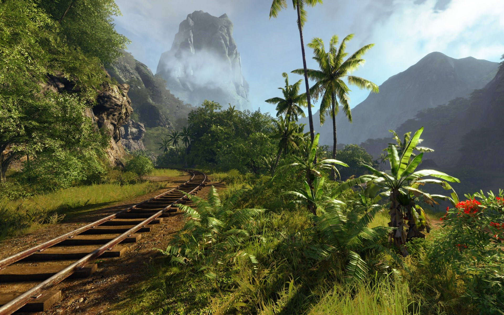 A serene nature landscape featuring lush greenery, palm trees, and a distant mountain, complemented by an old railway track, serving as a stunning HD desktop wallpaper background.