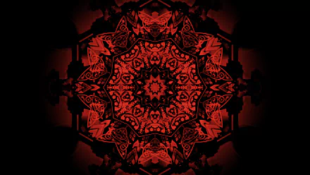 A vibrant red mandala with intricate abstract patterns, rendered in 4K Ultra HD for a striking PC desktop wallpaper and background.