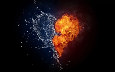 An artistic HD desktop wallpaper featuring a striking heart shape formed by splashes of water and flames, symbolizing contrasting elements. A captivating and vibrant background.