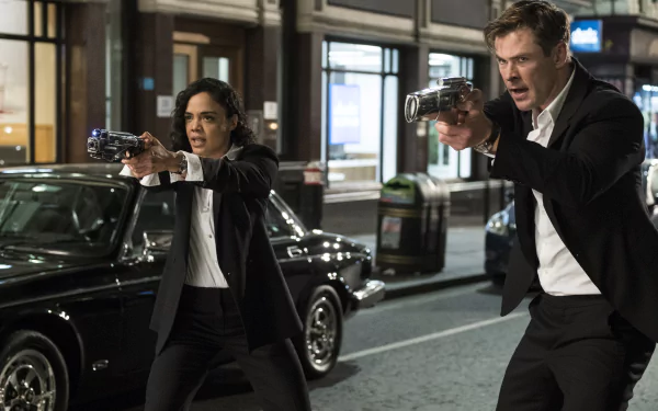 Tessa Thompson Chris Hemsworth movie Men in Black: International HD Desktop Wallpaper | Background Image