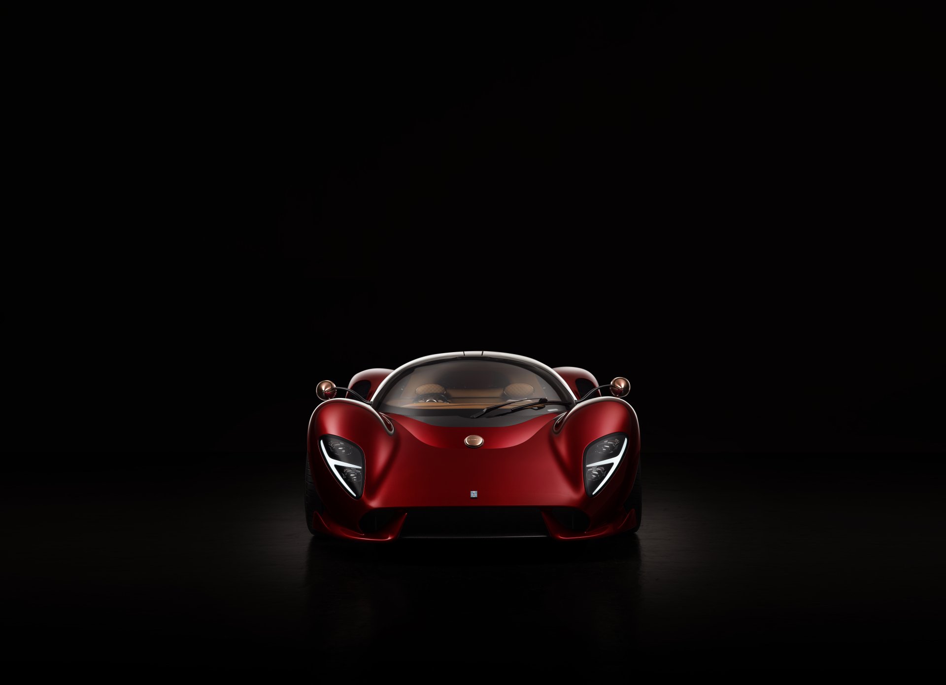 Front view of a red De Tomaso P72 car — a high-end supercar vehicle — on a black background, 8K Ultra HD PC desktop wallpaper.