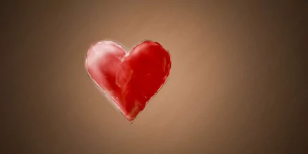 An artistic depiction of a heart, rendered in rich red tones against a subtle brown background, making for an evocative HD desktop wallpaper.