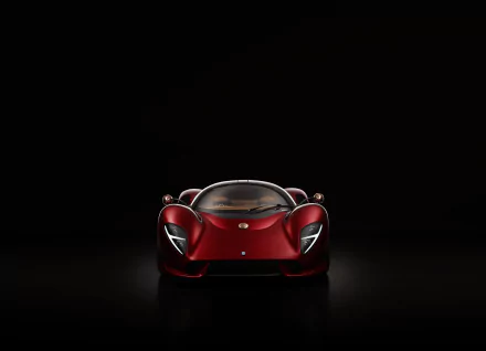 Front view of a red De Tomaso P72 car — a high-end supercar vehicle — on a black background, 8K Ultra HD PC desktop wallpaper.