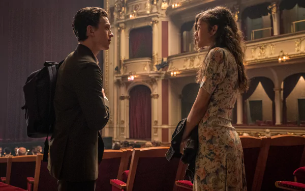 4K Ultra HD wallpaper featuring Tom Holland as Spider-Man and Zendaya as MJ in a scene from Spider-Man: Far From Home, set inside an ornate theater.