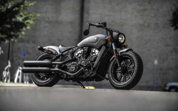 Custom Indian Scout motorcycle parked in a picturesque setting, making the perfect HD desktop wallpaper.