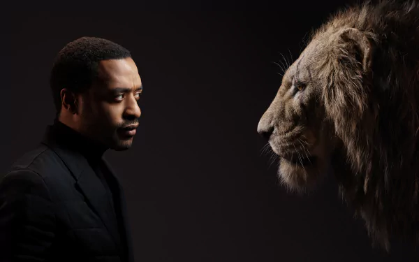 2K Quad HD PC wallpaper: an actor in profile confronts Scar from The Lion King (2019), a brooding cinematic live-action movie portrait.