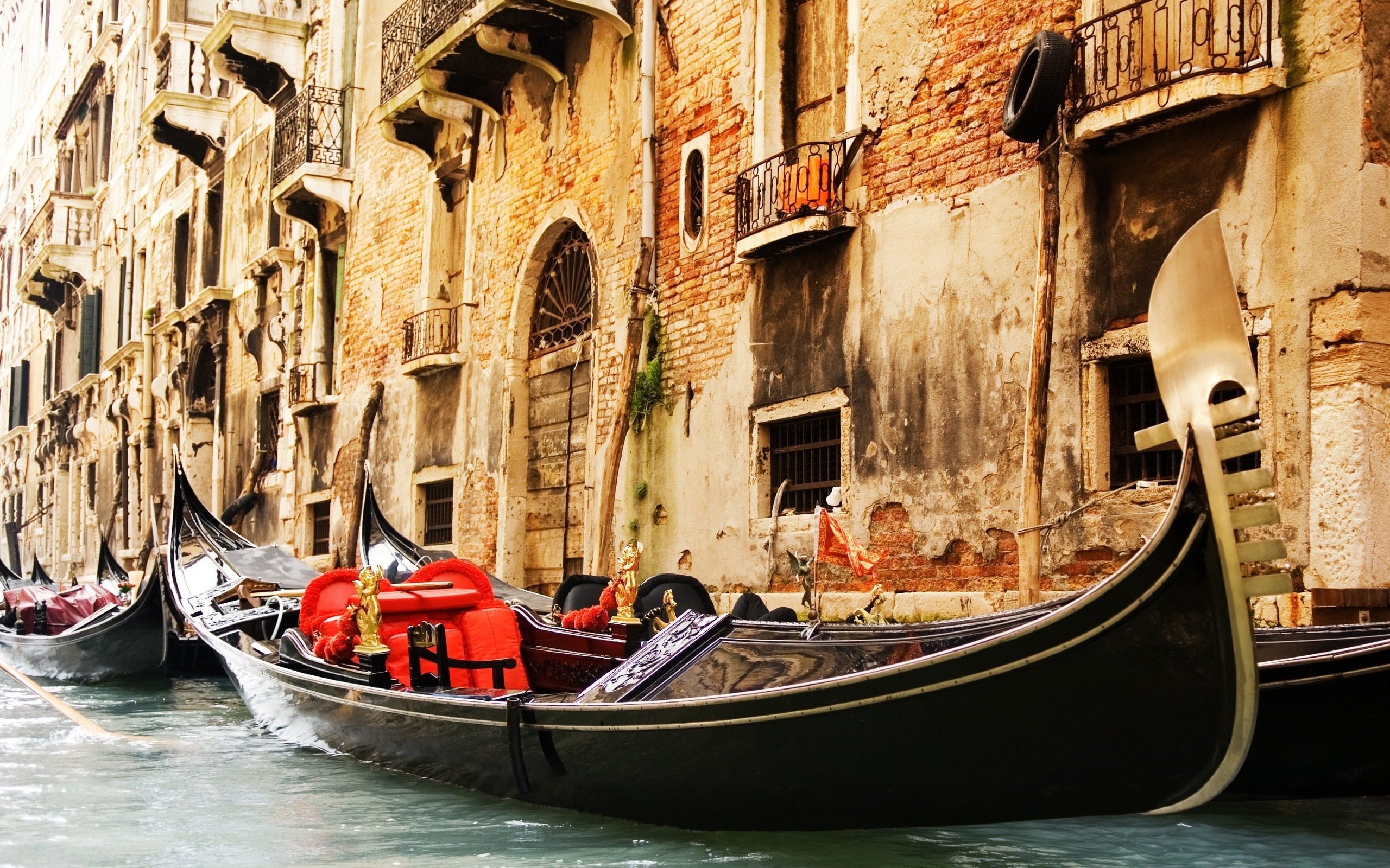 Venice Gondola in Italy: A picturesque scene of a gondola floating along the canals of Venice.