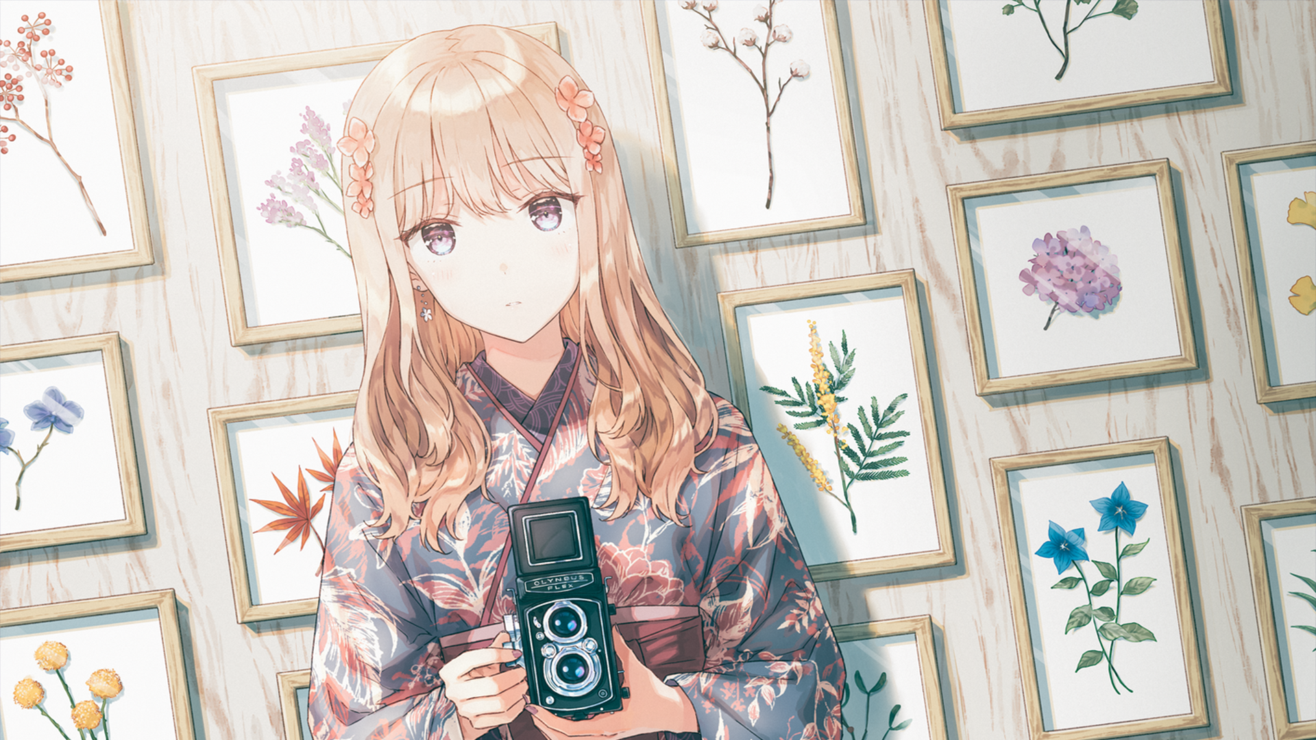Anime artwork featuring a blonde girl with grey eyes in a floral yukata, holding a vintage camera. The background displays framed botanical illustrations, enhancing the serene atmosphere. HD desktop wallpaper.