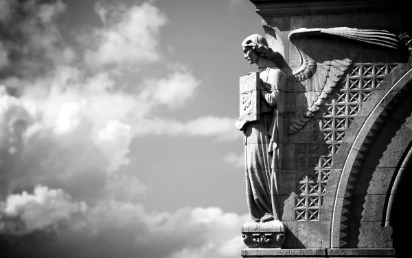  Statue of an Angel on a Church in France, Europe by Leslin_Liu