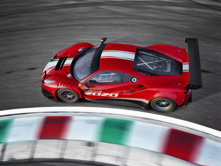 Aerial view of a red Ferrari 488 GT3 Evo racing a curbed track bend; supercar car and vehicle close-up — Ferrari 488, 5K Ultra HD PC desktop wallpaper