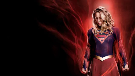 Kara Danvers as Supergirl in her suit amid swirling red energy, dramatic DC Comics TV show 4K Ultra HD desktop wallpaper.