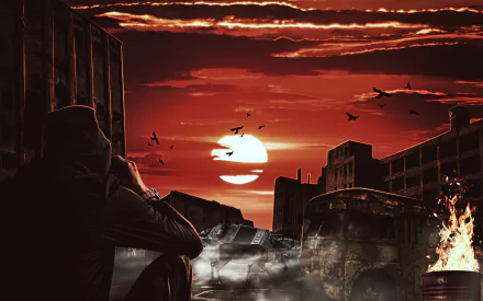 Sci-fi post-apocalyptic 4K Ultra HD PC desktop wallpaper and background: lone survivor by burning barrel in a ruined city, red sun setting on the horizon, birds circling.