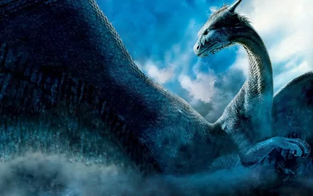 HD desktop wallpaper of a majestic dragon from the fantasy movie Eragon, set against a dramatic sky backdrop.