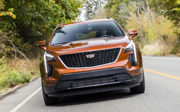 orange car SUV car Cadillac vehicle Cadillac XT4 HD Desktop Wallpaper | Background Image