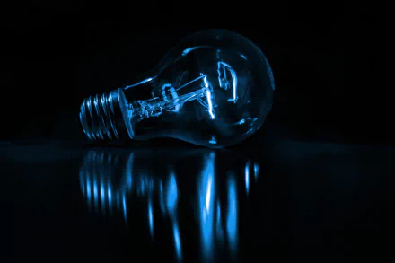  Blue Light Bulb by Dewald Van Rensburg