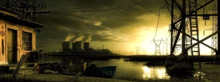 HD desktop wallpaper showing a power plant by calm water under a dramatic sky at sunset, with silhouetted electrical towers and reflections on the water.