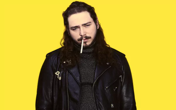HD desktop wallpaper of Post Malone in a black leather jacket against a yellow background.