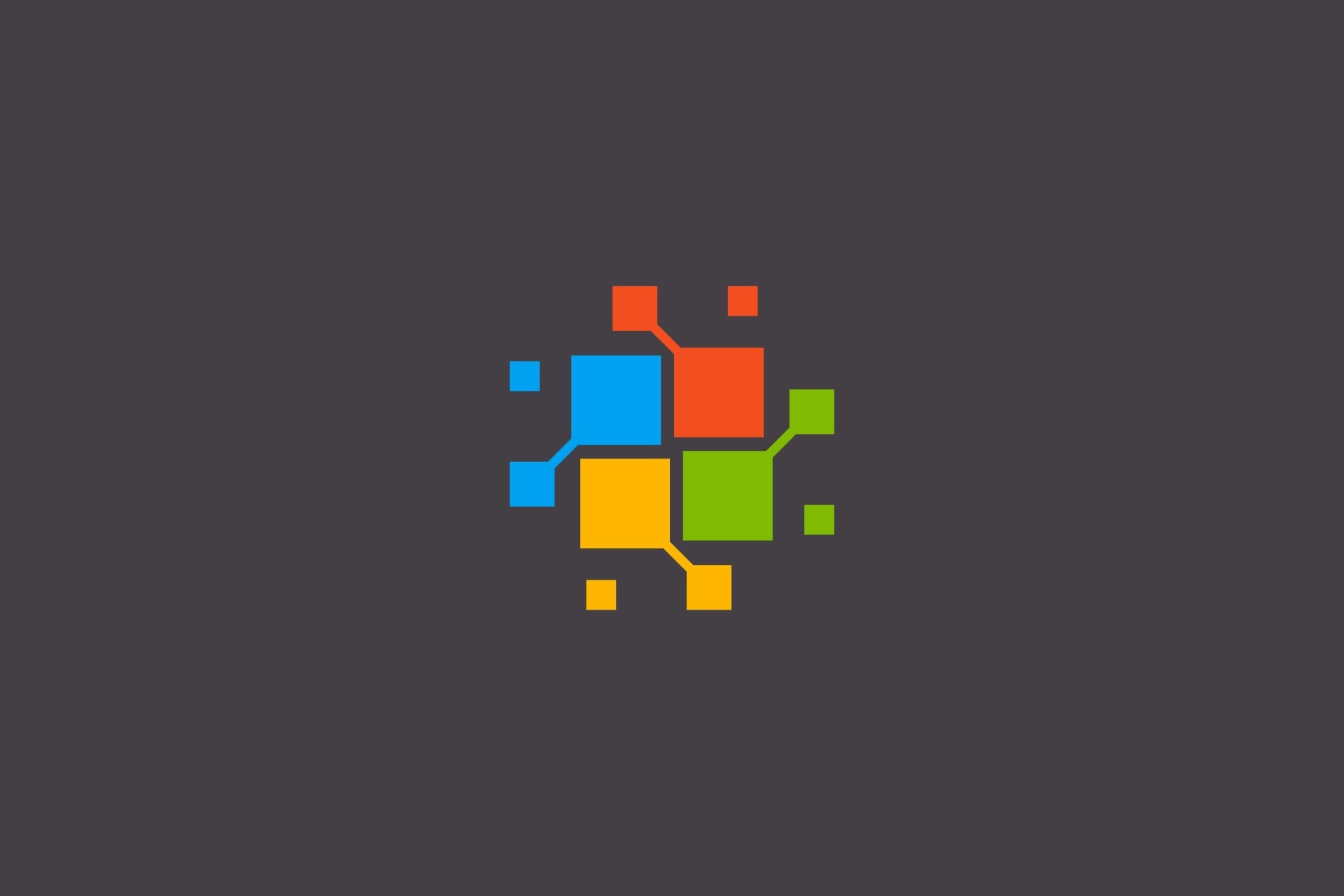 Dark gray 4K Ultra HD PC desktop wallpaper with a colorful, pixelated Windows technology logo centered, conveying a modern, minimal tech aesthetic.