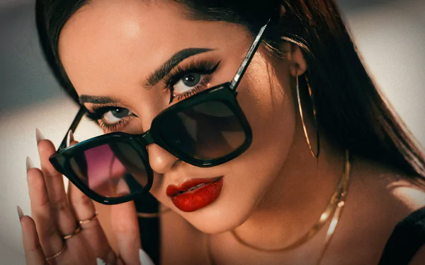 4K Ultra HD portrait of a singer's face with bold red lipstick, dramatic eye makeup and sunglasses — a music-themed PC desktop wallpaper background.