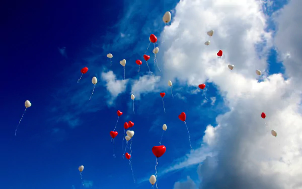  Balloons in cloudy sky
