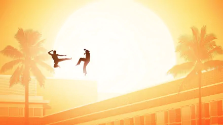 HD Cobra Kai wallpaper featuring silhouettes of martial artists mid-jump against a sunset backdrop with palm trees.