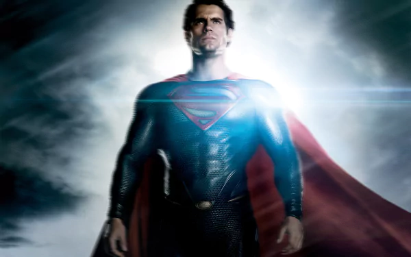 HD desktop wallpaper of Henry Cavill as Superman from the movie Man of Steel, featuring him in the iconic suit with a red cape and a glowing background.