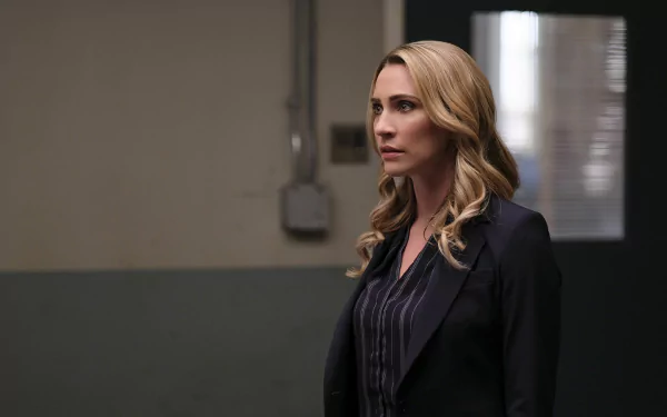 HD desktop wallpaper featuring a woman in a professional suit against an indoor background, tagged with Jessica Harmon.