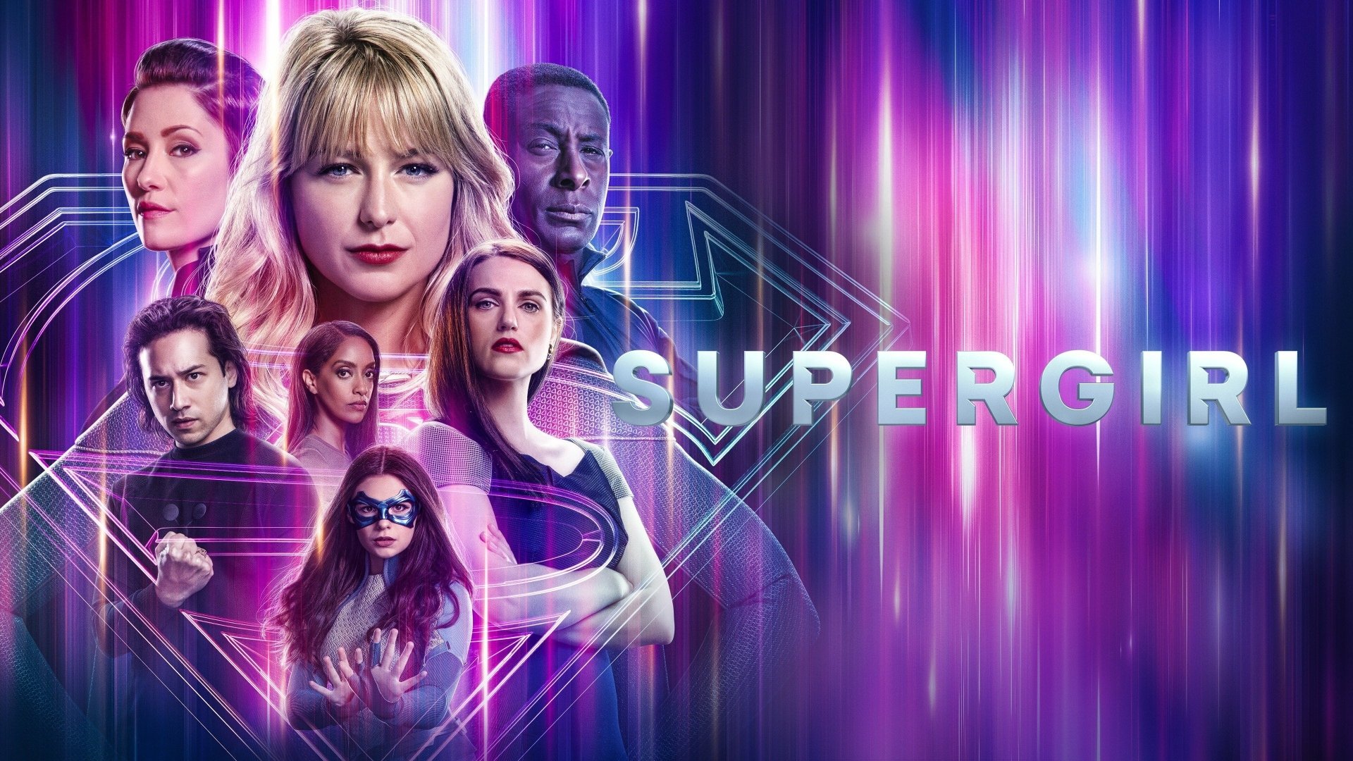 4K Ultra HD PC desktop wallpaper: Supergirl TV show ensemble portraits over neon purple-pink streaked background, featuring the Supergirl emblem and glowing title.