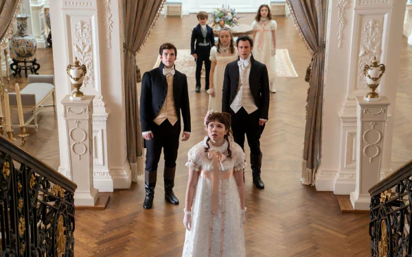 HD desktop wallpaper featuring characters from Bridgerton in elegant period costumes inside a grand room with ornate decor.