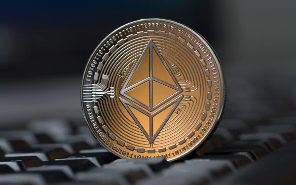 HD desktop wallpaper featuring an Ethereum cryptocurrency coin with a sharp focus on a textured surface.
