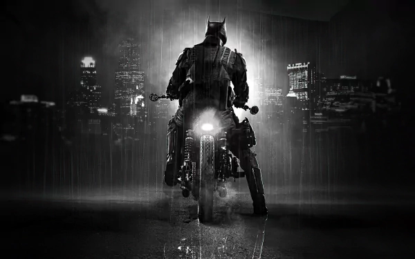 HD desktop wallpaper featuring Batman from the movie The Batman, shown riding a motorcycle against a rainy, dark cityscape backdrop.