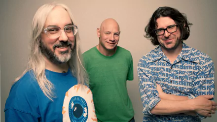 HD wallpaper featuring three members of the band Dinosaur Jr. posing together for a portrait.
