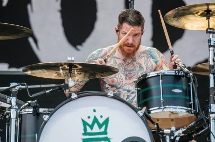 Drummer of Fall Out Boy in action HD desktop wallpaper and background.