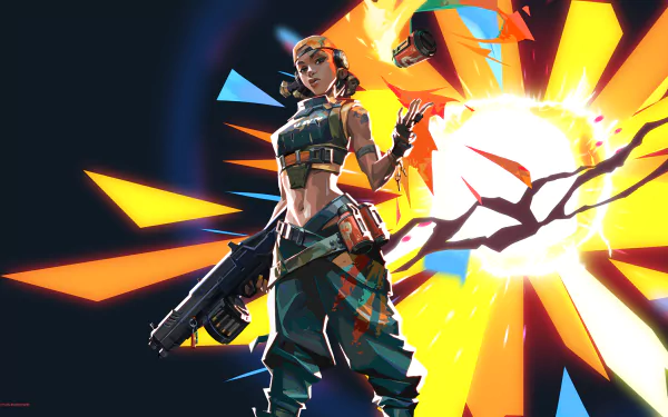 Raze from Valorant stands confidently with explosives, set against a dynamic, colorful explosion in this 4K Ultra HD PC desktop wallpaper.