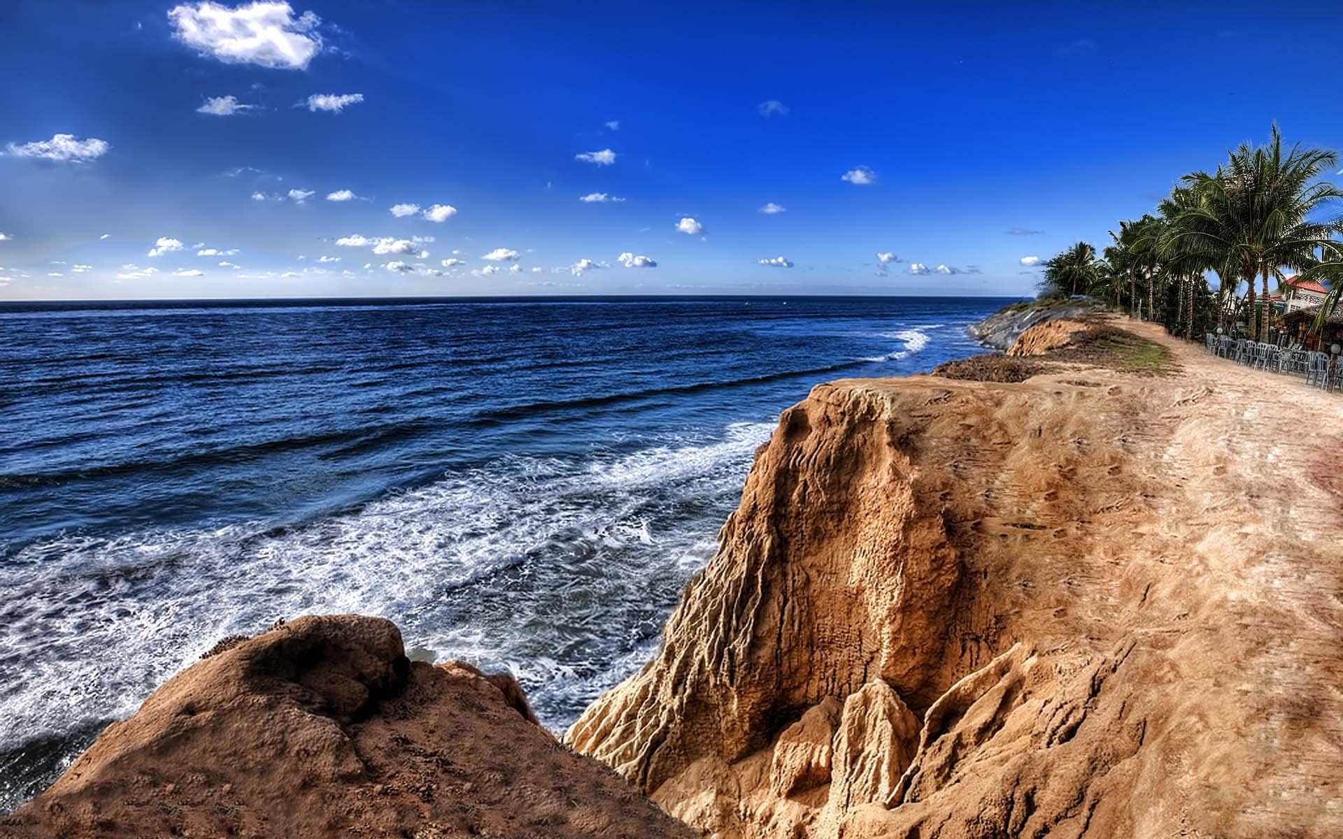 A serene coastline view showcasing the beauty of nature, ideal for a refreshing desktop wallpaper.