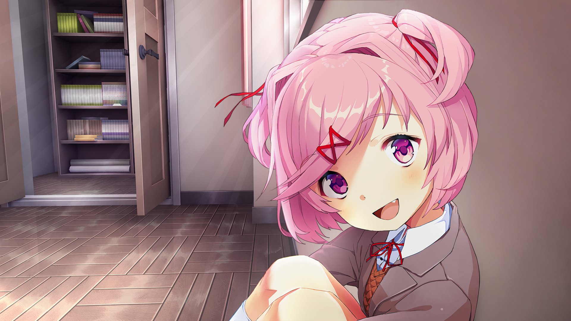 HD PC desktop wallpaper: Natsuki (Doki Doki Literature Club!) — pink‑haired anime girl from the video game, smiling while seated in a classroom background.