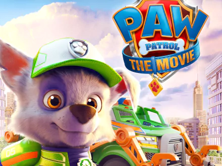HD PC desktop wallpaper/background of Paw Patrol: The Movie — a smiling pup in a green cap, the movie logo, a rescue vehicle and a sunlit city skyline.