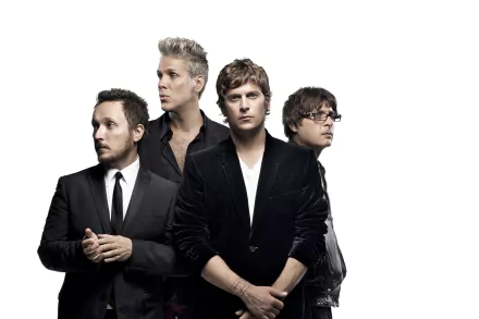 HD desktop wallpaper featuring a group of four musicians against a light background, representing the band associated with Matchbox Twenty.