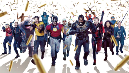 HD PC desktop wallpaper featuring the full cast of The Suicide Squad movie running forward with bullets flying around.