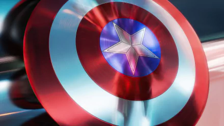 Close-up of a glossy Captain America comic shield—red, white and blue concentric rings with central star—rendered as a 4K Ultra HD PC desktop wallpaper background.
