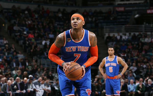 Basketball player in New York Knicks uniform preparing to shoot a free throw, HD desktop wallpaper and background.