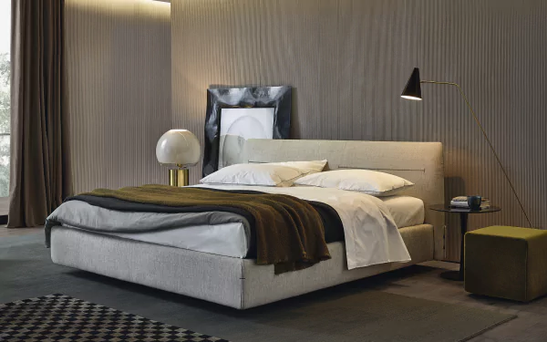 Stylish modern bedroom with elegant bedding and contemporary decor for HD desktop wallpaper background.