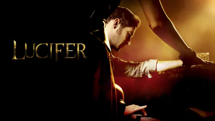 HD PC desktop wallpaper: Lucifer Morningstar (Lucifer TV show) at a piano, brooding in warm light as a woman's leg drapes over the instrument, moody TV show background.