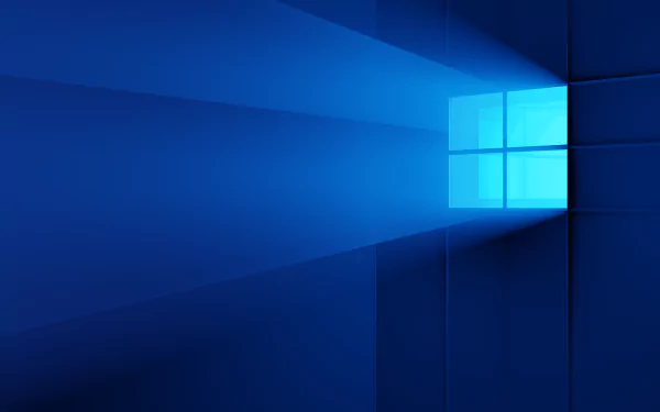 4K Ultra HD desktop wallpaper featuring a glowing Windows 10 logo casting light across a sleek, modern blue-toned technology-inspired background.
