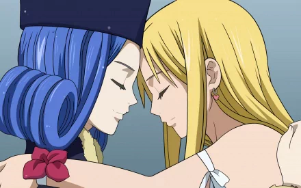 A vibrant HD wallpaper featuring Juvia Lockser and Lucy Heartfilia from the anime Fairy Tail, capturing a heartfelt moment between the two characters.
