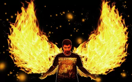 HD PC desktop wallpaper featuring a dark angel with fiery, glowing wings spreading behind a mysterious figure against a black background.