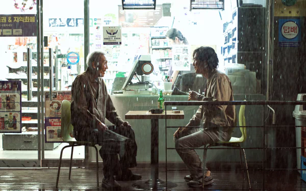 Lee Jung-jae in a rainy street scene from the TV show Squid Game, captured in a 4K Ultra HD desktop wallpaper and background.