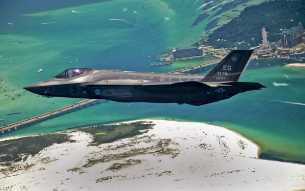  An F-35 Lightning II flies over Destin, Fla., before landing at its new home at Eglin Air Force Base by US Air Force