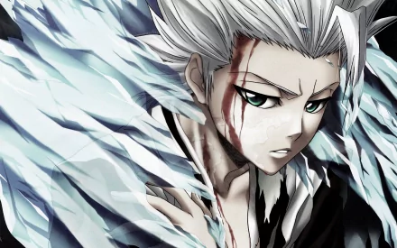 HD desktop wallpaper featuring Tōshirō Hitsugaya from the anime Bleach, depicting him with an intense expression and icy elements surrounding him.